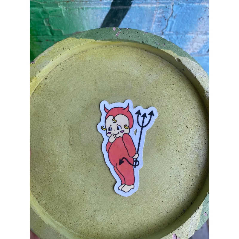 Kewpie doll devil baby